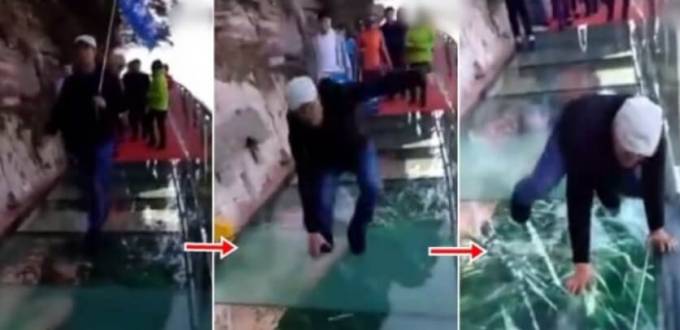 Пожилой китаец чуть не лишился чувств, когда под его ногами стал трескаться стеклянный мост. (Видео)