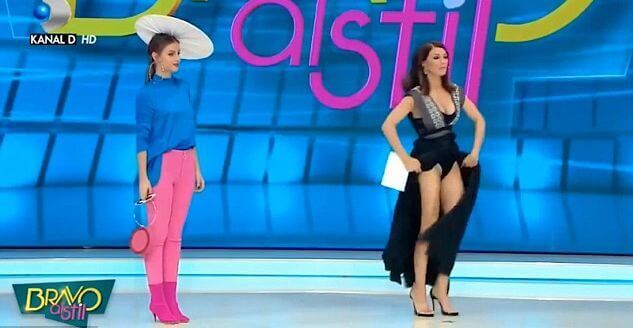 Телеведущая, охваченная паникой, принялась за поиски паука во время ток-шоу на румынском телевидении. (Видео)
