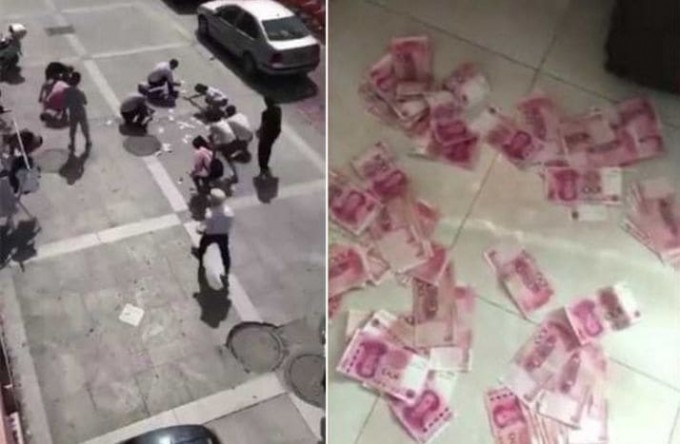 Склока супругов закончилась денежным «дождём» в Китае (Видео)