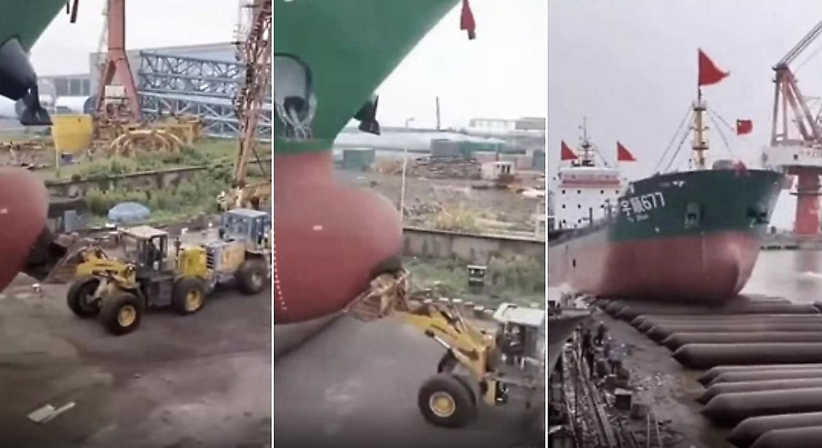 Зрелищный спуск судна на воду с использованием бульдозеров, снял рабочий в Китае