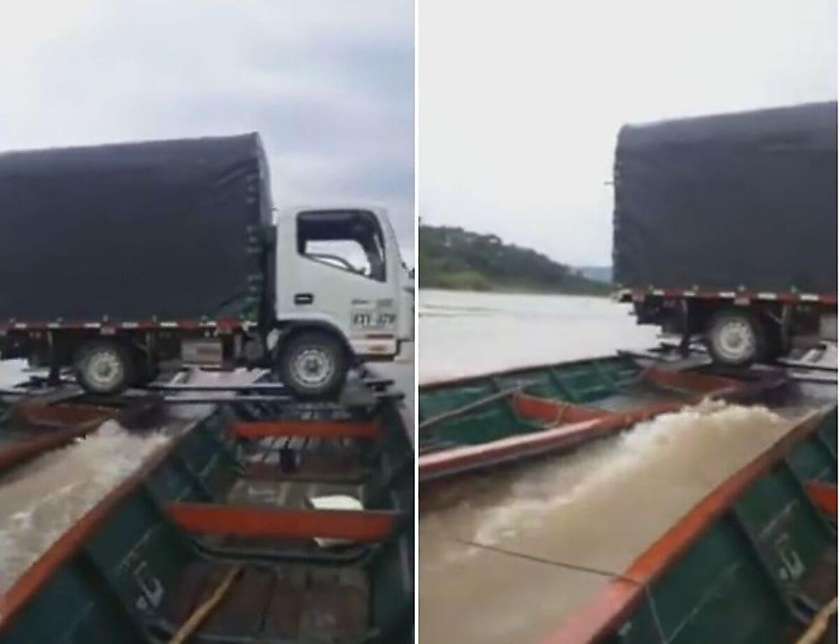 Грузовик, сбалансированный на двух лодках, доставили по реке в Колумбии