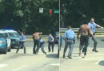 Темнокожий американец дал бой 4-м полицейским, попытавшимся арестовать его (Видео)