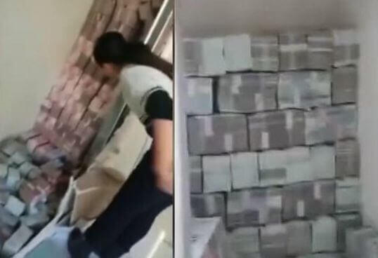 Китаянка обнаружила 140 миллионов юаней в стене купленного ею жилища. (Видео)