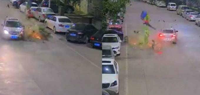 Лобовое столкновение мотоциклиста с автомобилем было запечатлено в Китае (Видео)