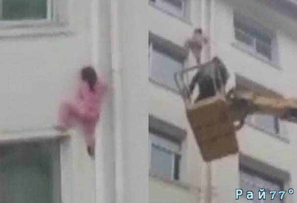 Китайский электрик спас девочку, вылезшую из окна квартиры на шестом этаже (Видео)
