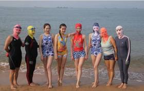 Китайские «антизагарные» костюмы становятся популярными в Австралии 1
