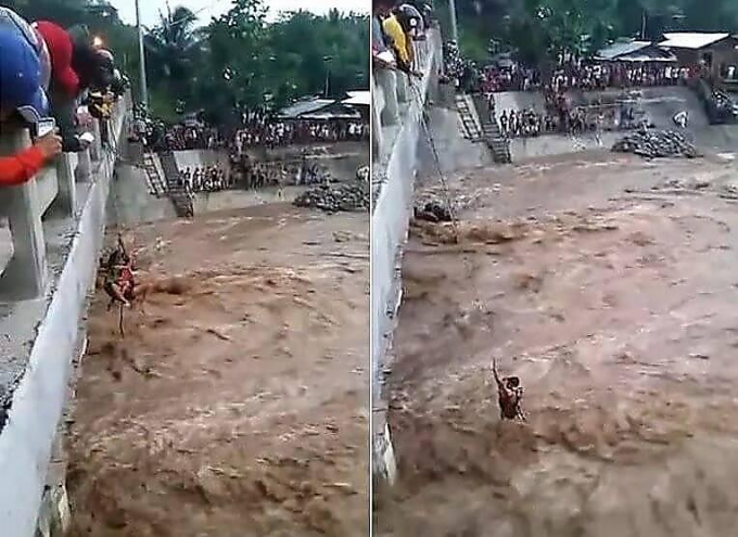 Унесённых бурной рекой мать с тремя детьми спасли на Филиппинах