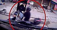 Шлем спас жизнь мотоциклисту, «проверившего на прочность» крюк автокрана в Китае