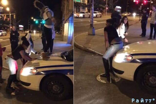 Полицейские разрешили девушкам исполнить эротический танец на капоте своего автомобиля. (Видео)