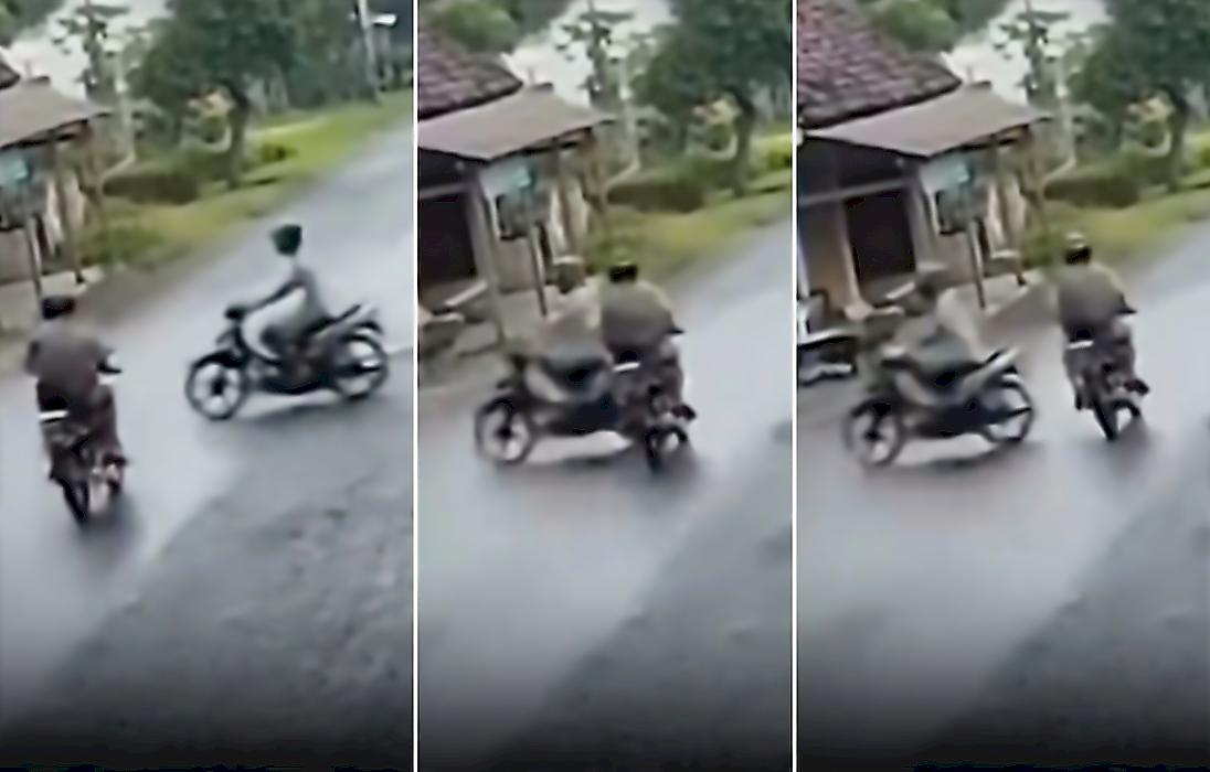 Мотоциклисты чудом разъехались и попали на видео на перекрёстке в Индонезии
