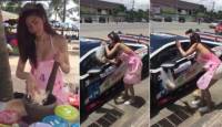 Уличная торговка обслужила необычного клиента на автотрассе в Таиланде. (Видео)