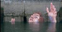 Гавайский художник создал гигантскую роспись на стене залива в Канаде в виде исчезающей с приливом женщины. (Видео) 0