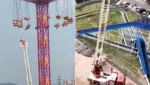 Любители аттракционов провели незабываемые два часа на 30-метровой высоте гигантской карусели в Китае (Видео)