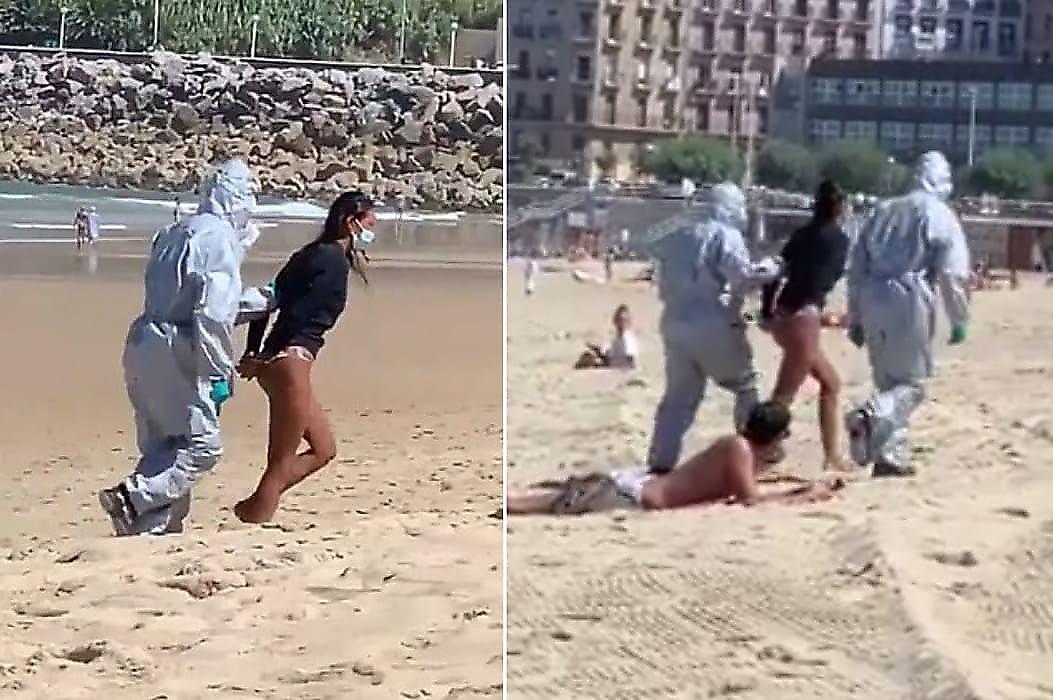 Нарушившую карантин серфингистку насильно увели с испанского пляжа - видео