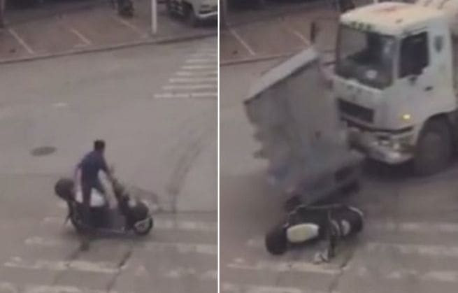 Китаец успел отбежать, после чего цементовоз «припарковал» фургон на его мотоцикле (Видео)