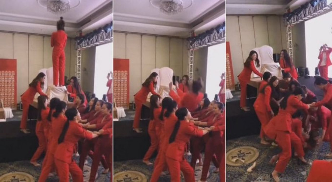 Участницы группы поддержки не смогли поймать свою коллегу во время исполнения трюка в Китае (Видео)