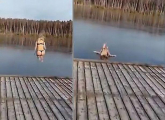 Молодая экстремалка переоценила массу своего тела во время водных процедур на замёрзшем озере (Видео)