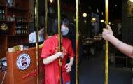 Китайский ресторан предлагает скидки для тощих клиентов, которые смогут преодолеть специальное ограждение 4