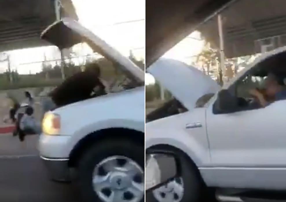 Водитель прокатил несговорчивого «пассажира» под капотом своего пикапа - видео